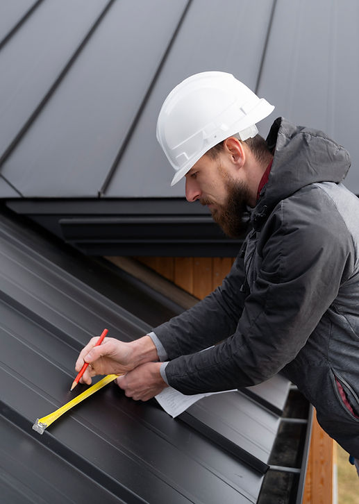 man-working-roof-medium-shot.jpg